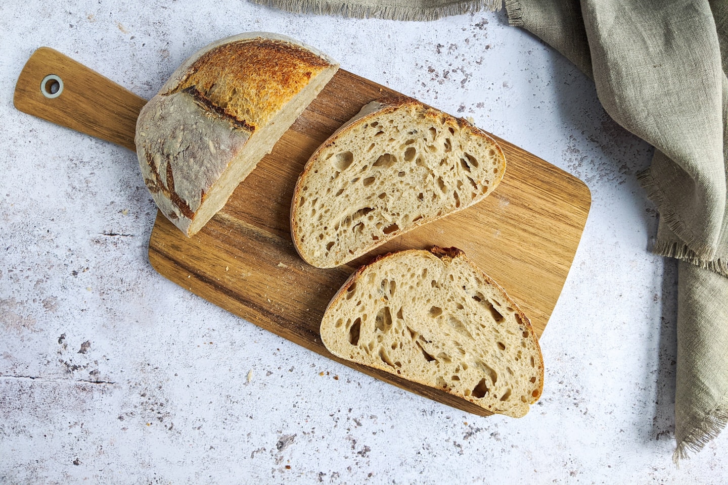 brown bread on brown wooden chopping board